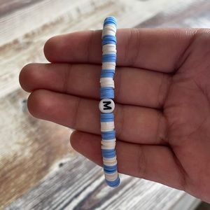Blue bracelet with letter M
